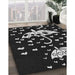 Patterned Black Novelty Rug in Family Room, pat1951