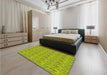 Patterned Dark Yellow Green Rug in a Bedroom, pat1992yw