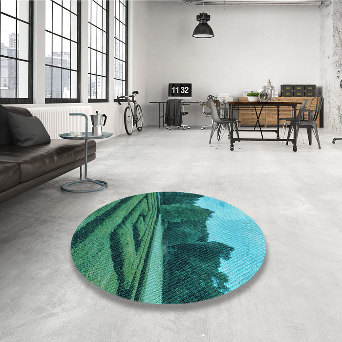 Round Patterned Dark Turquoise Green Rug in a Office, pat1999lblu