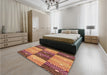 Patterned Yellow Orange Rug in a Bedroom, pat20org