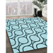 Patterned Deep-Sea Green Rug in Family Room, pat2037lblu