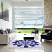 Square Patterned Cobalt Blue Novelty Rug in a Living Room, pat2050