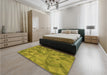 Patterned Dark Yellow Green Rug in a Bedroom, pat2077org