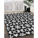 Patterned Black Novelty Rug in Family Room, pat2087