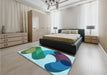 Patterned Greenish Blue Green Rug in a Bedroom, pat2114lblu