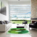 Square Patterned Green Rug in a Living Room, pat2119grn