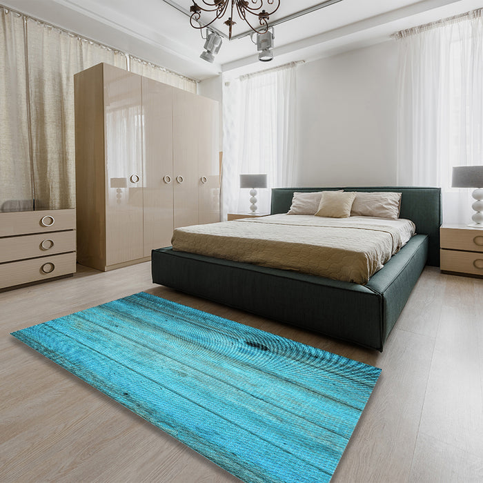 Patterned Bright Turquoise Blue Rug in a Bedroom, pat2125lblu