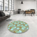 Round Patterned Blue Green Rug in a Office, pat2129lblu