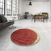 Round Patterned Red Rug in a Office, pat2135brn