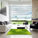 Square Patterned Dark Lime Green Rug in a Living Room, pat2152yw