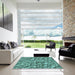 Square Patterned Turquoise Green Rug in a Living Room, pat2159lblu