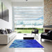 Square Patterned Blue Novelty Rug in a Living Room, pat2167