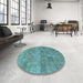Round Patterned Medium Turquoise Green Rug in a Office, pat2177lblu