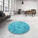 Round Patterned Dark Turquoise Green Rug in a Office, pat2182lblu