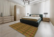 Patterned Caramel Brown Rug in a Bedroom, pat220org