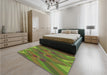 Patterned Antique Bronze Green Rug in a Bedroom, pat2246brn