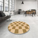 Round Patterned Yellow Rug in a Office, pat225org