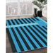 Patterned Deep-Sea Blue Rug in Family Room, pat2310lblu