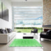 Square Patterned Green Rug in a Living Room, pat2316grn