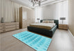 Patterned Bright Turquoise Blue Rug in a Bedroom, pat2316lblu