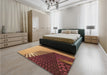 Patterned Saffron Red Rug in a Bedroom, pat232org