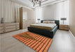 Patterned Neon Orange Rug in a Bedroom, pat234org