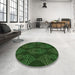 Round Patterned Black Rug in a Office, pat2400grn