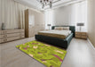 Patterned Dark Yellow Green Rug in a Bedroom, pat2401org