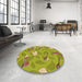 Round Patterned Dark Yellow Green Rug in a Office, pat2401org