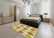 Patterned Brown Gold Rug in a Bedroom, pat245org