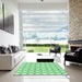 Square Patterned Green Rug in a Living Room, pat2450grn