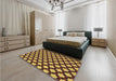 Patterned Deep Yellow Rug in a Bedroom, pat2529brn