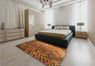 Patterned Saffron Red Rug in a Bedroom, pat2561org