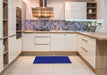 Patterned Earth Blue Rug in a Kitchen, pat2571blu