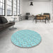 Round Patterned Blue Rug in a Office, pat2576lblu