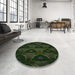 Round Patterned Black Rug in a Office, pat2608grn