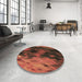 Round Patterned Red Rug in a Office, pat2656brn