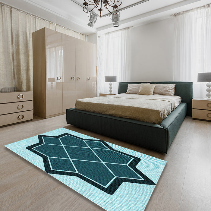 Patterned Medium Teal Green Rug in a Bedroom, pat2664lblu