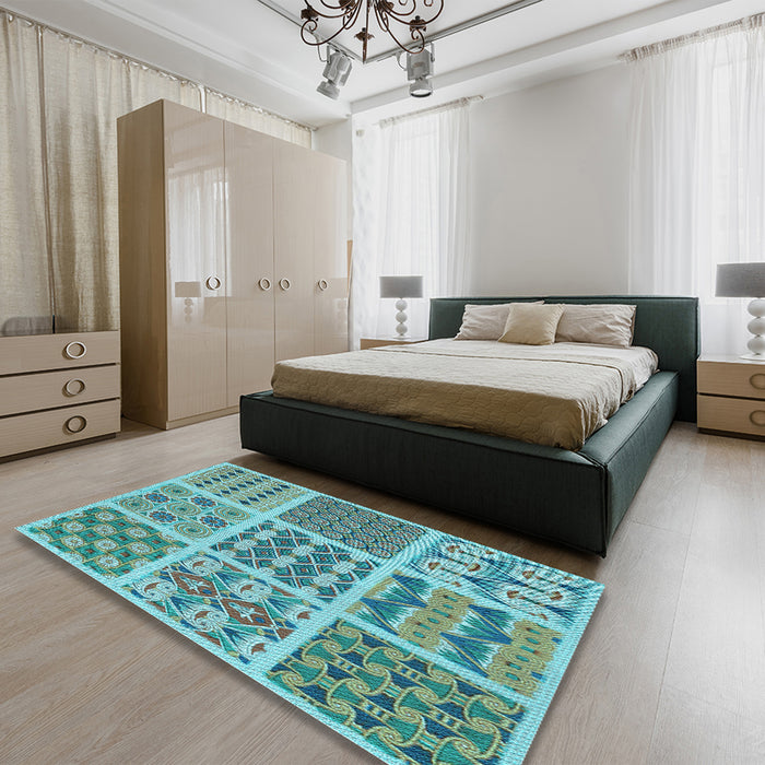Patterned Aquamarine Stone Green Rug in a Bedroom, pat2682lblu