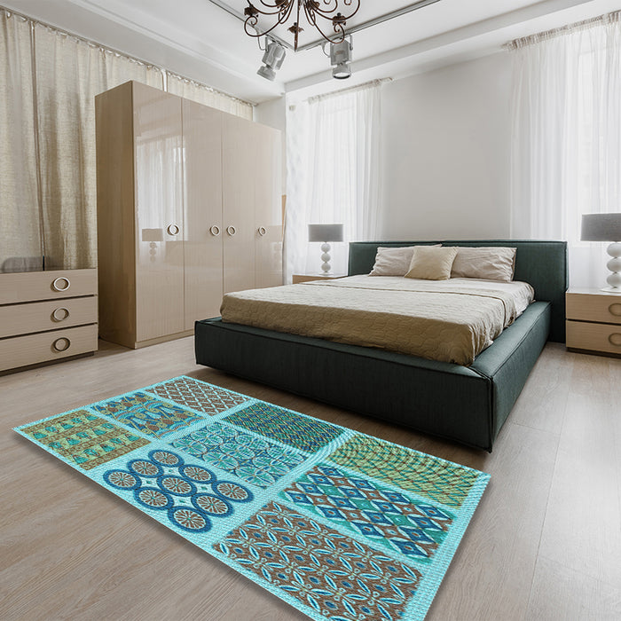Patterned Turquoise Green Rug in a Bedroom, pat2685lblu