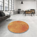 Round Patterned Orange Red Orange Rug in a Office, pat271brn