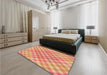 Patterned Yellow Orange Rug in a Bedroom, pat2725org