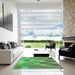 Square Patterned Green Rug in a Living Room, pat2770grn