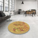 Round Patterned Deep Yellow Rug in a Office, pat2780brn