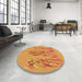 Round Patterned Neon Orange Rug in a Office, pat2780org