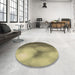 Round Patterned Metallic Gold Rug in a Office, pat2785brn