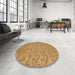 Round Patterned Yellow Rug in a Office, pat2797brn