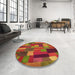 Round Patterned Red Rug in a Office, pat28org