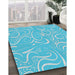 Patterned Blue Abstract Machine Washable Rug in a Family Room, wshpat2865