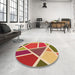 Round Patterned Red Rug in a Office, pat29org